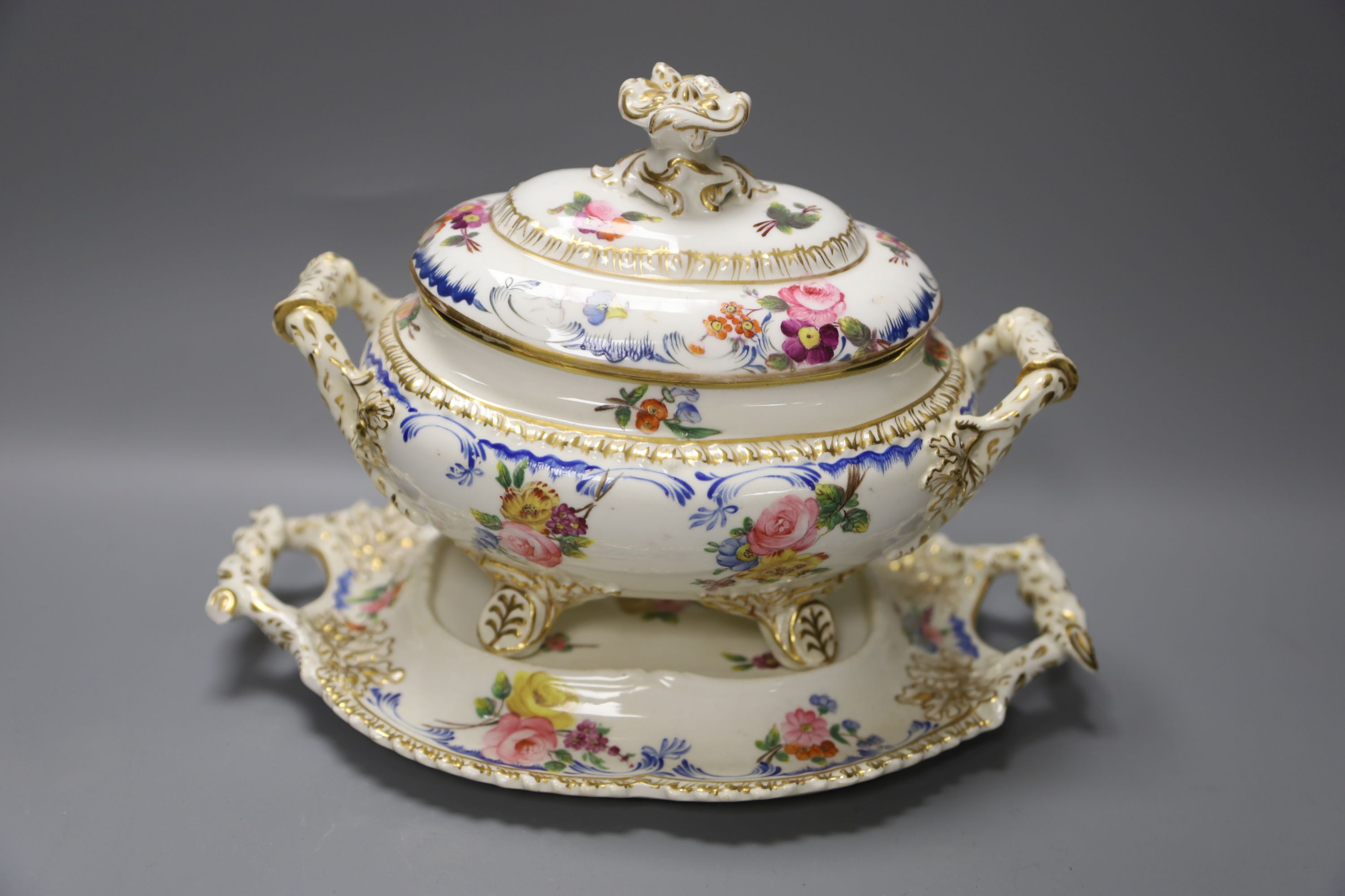 A pair of Ridgway porcelain tureens and integral stands and tureen cover and stand, height 18cm, a Royal Copenhagen figure and a Rosent